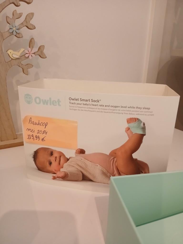 Owlet smart sock voetenalarmpje babyademhaling, Ophalen