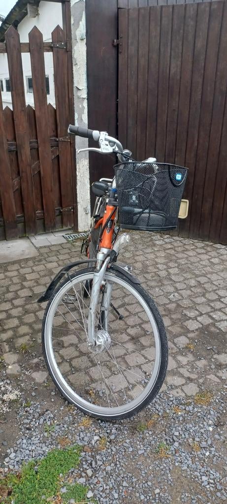 Sparta electrische vrouwenfiets met oplader achtermotor., Fietsen en Brommers, Ophalen
