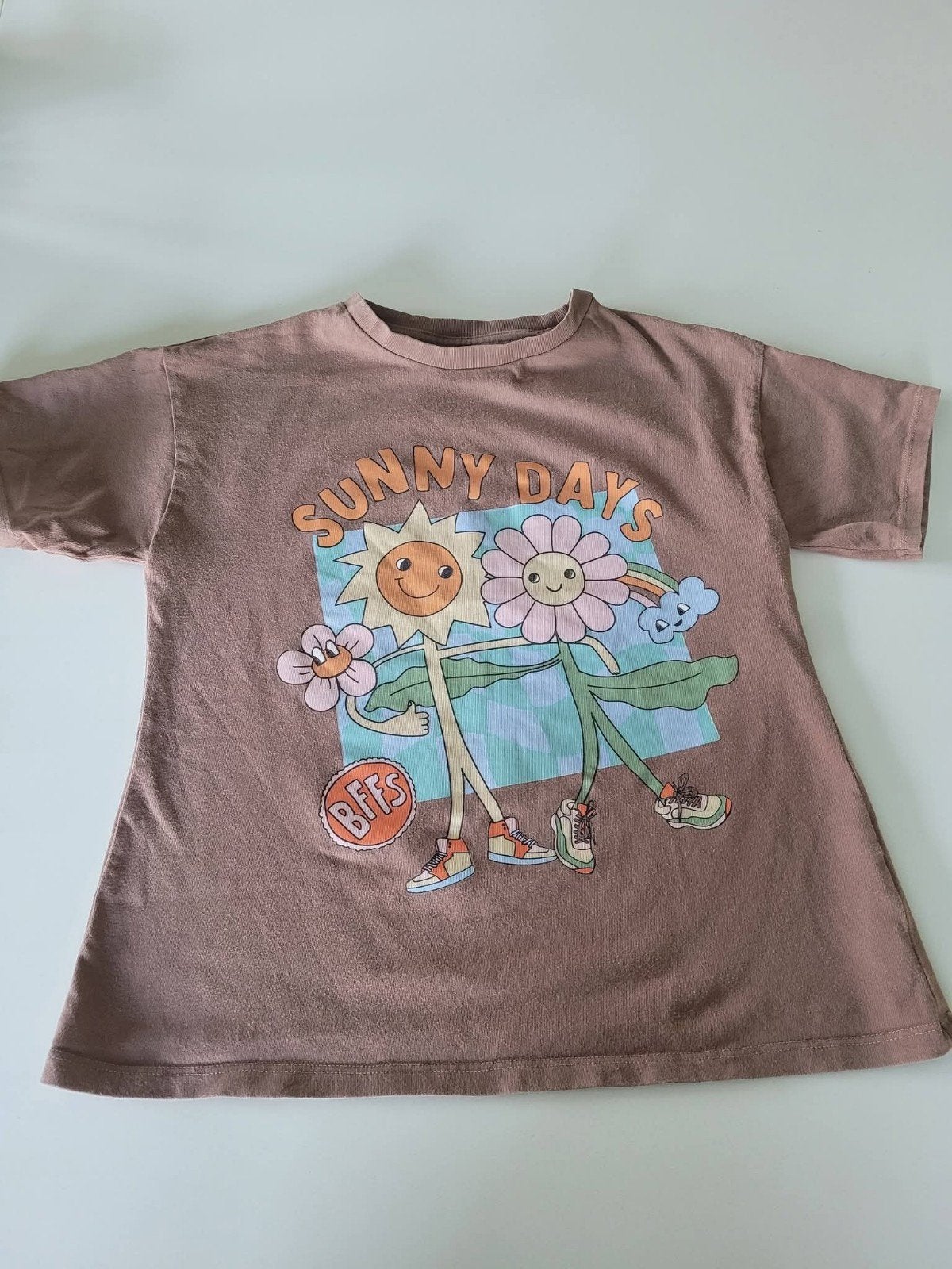 Bruin t-shirt bloemen Sunny Days
Maat: 134
Merk: Next, Enlèvement