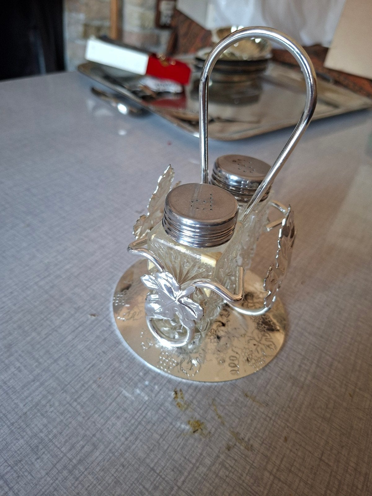 Zilver peper en zout houder, Ophalen