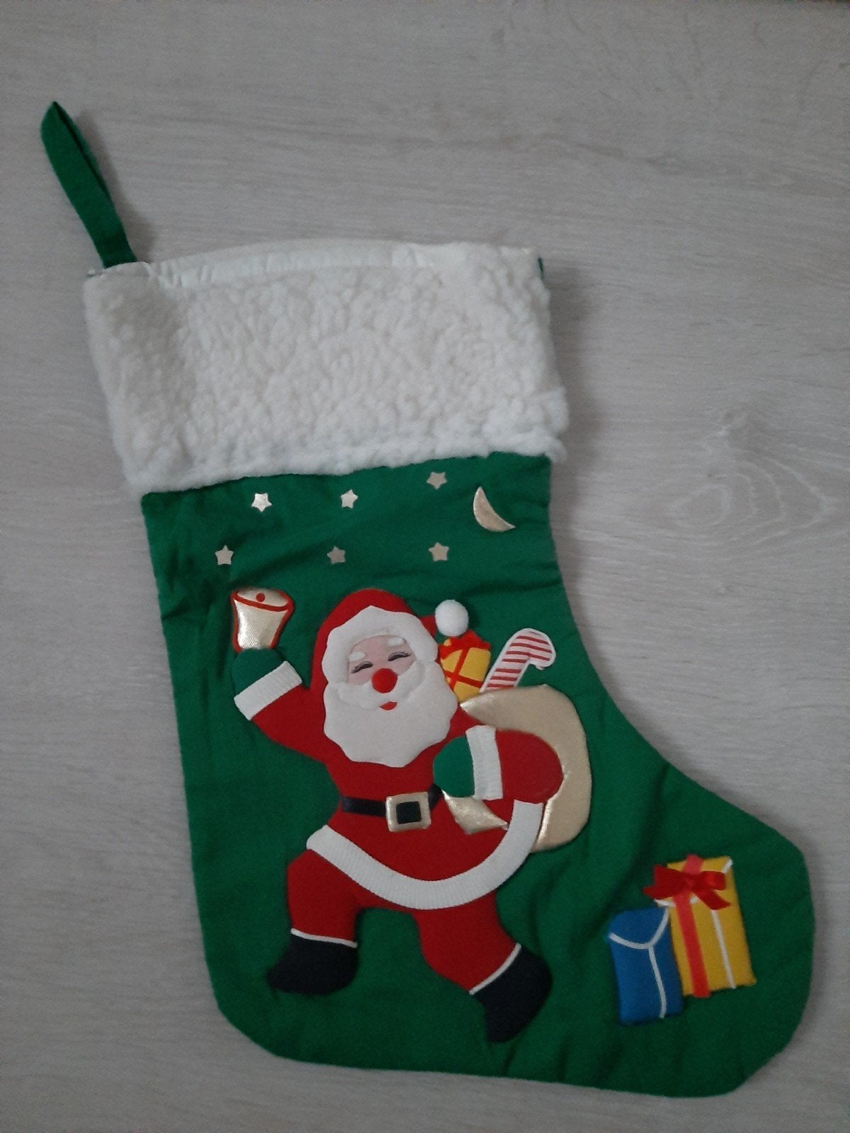 Kerstsok, Ophalen