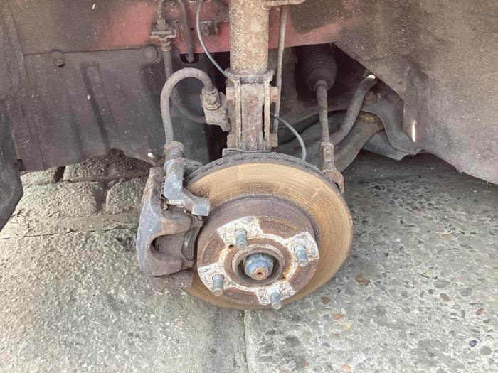 Fusee links-voor van een Suzuki Alto, Auto-onderdelen, Ophanging en Onderstel, Suzuki, Gebruikt, 3 maanden garantie, Ophalen of Verzenden