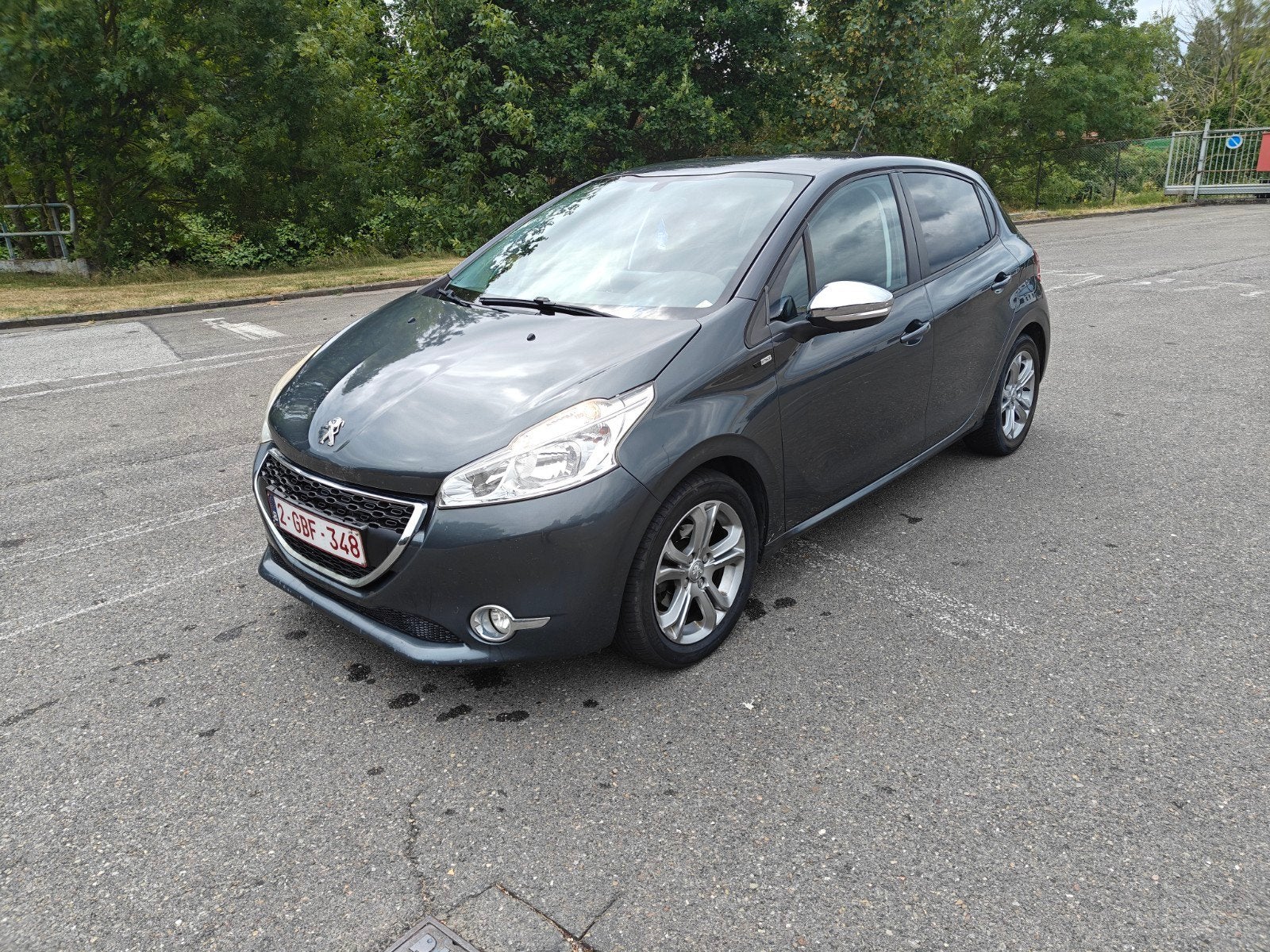 Peugeot 208 1.2 benzine, Voorwielaandrijving, Euro 5, Stof, Zwart