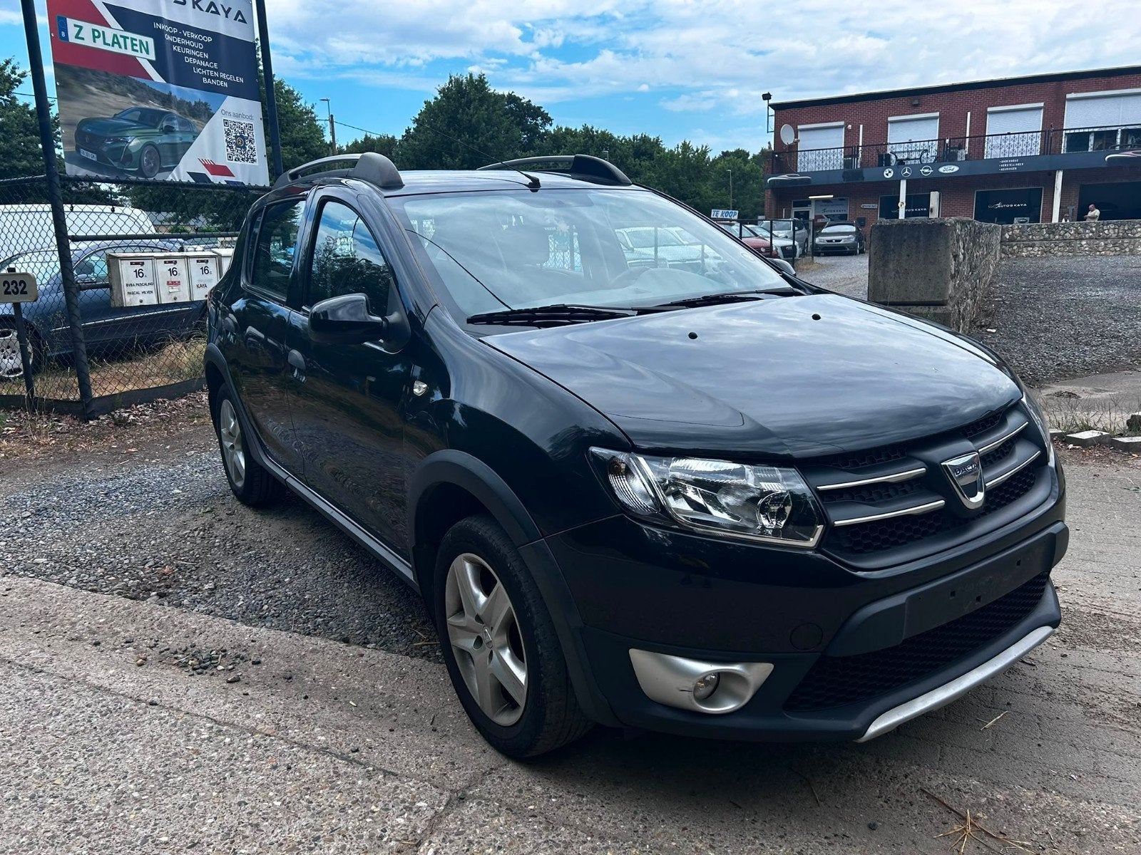 Dacia Sandero Stepway  73000 km bij 2013, Auto's, Voorwielaandrijving, Stof, Zwart, Bedrijf