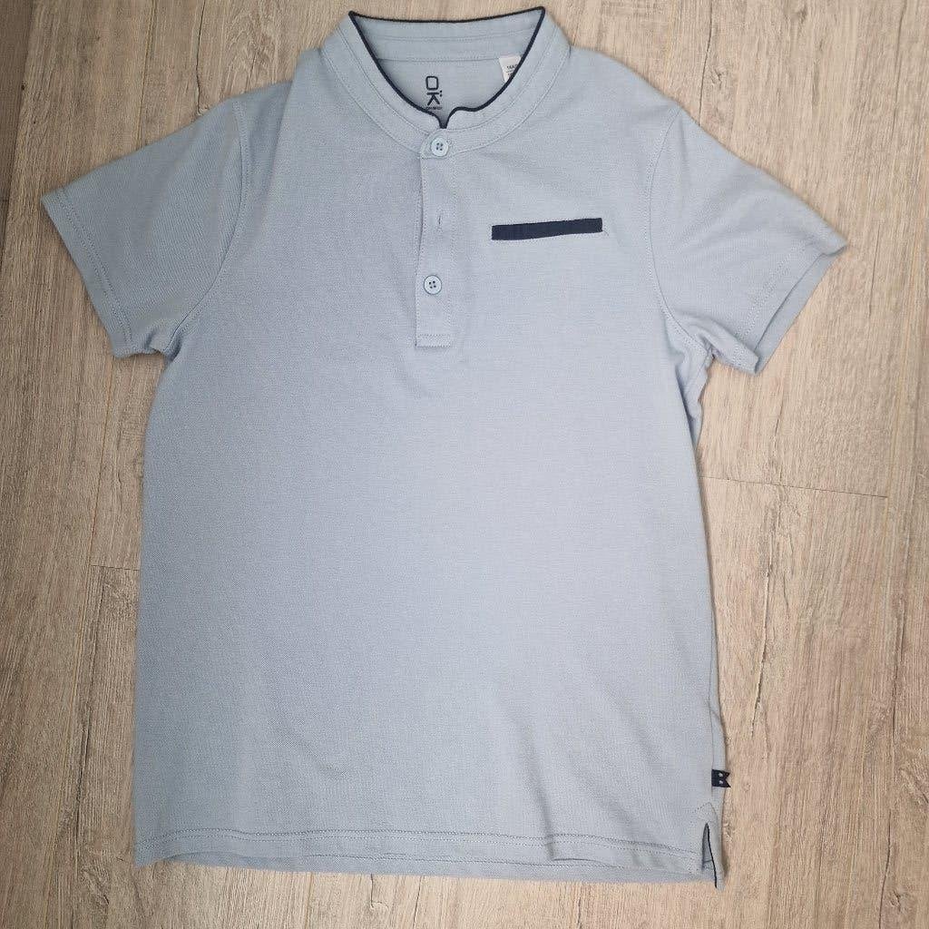 Lichtblauwe polo Okaïdi 164, Kinderen en Baby's, Okaidi, Ophalen of Verzenden, Zo goed als nieuw, Shirt of Longsleeve