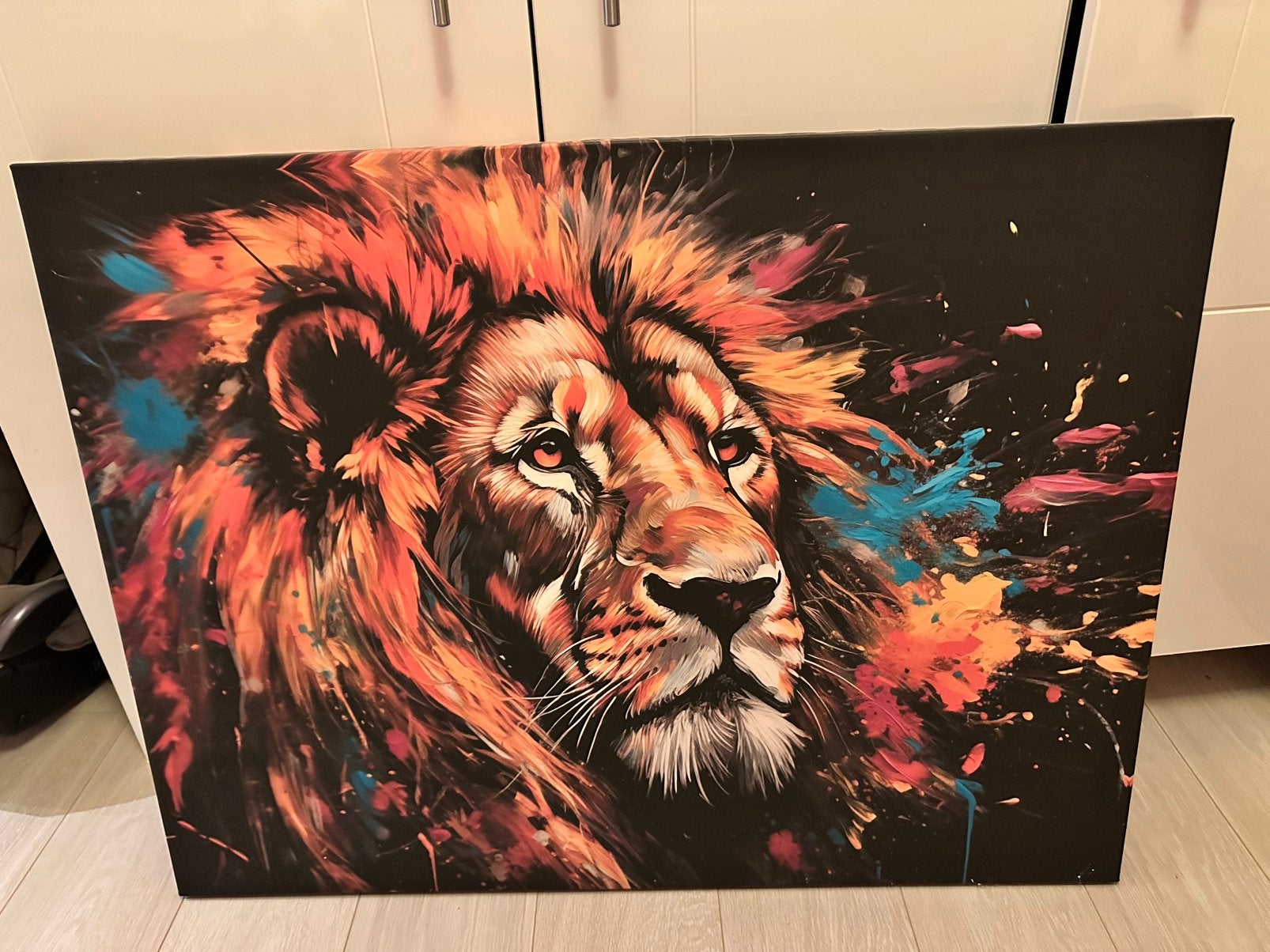 Leeuw canvas kleurrijk, Ophalen