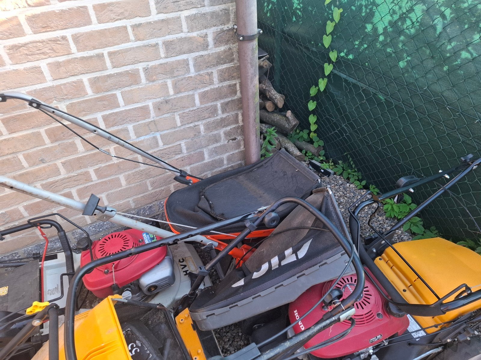 6 grasmaaiers voor onderdelen, Enlèvement