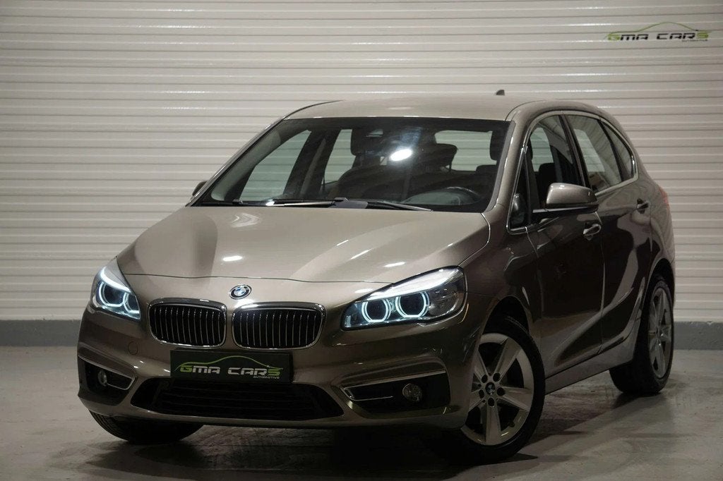 BMW 2 Serie 220 Active Tourer 220iA Benzine Aut-Nav-Airco-Le, Auto's, BMW, Automaat, 1998 cc, Gebruikt, Euro 6
