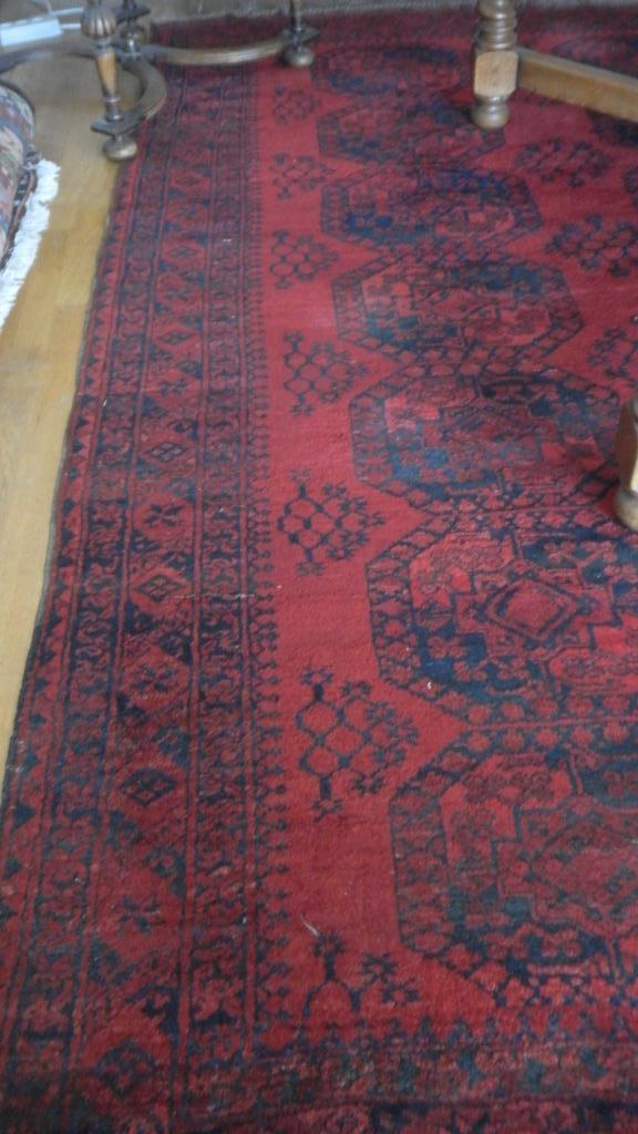 Afghaans wollen tapijt handgeknoopt, Ophalen