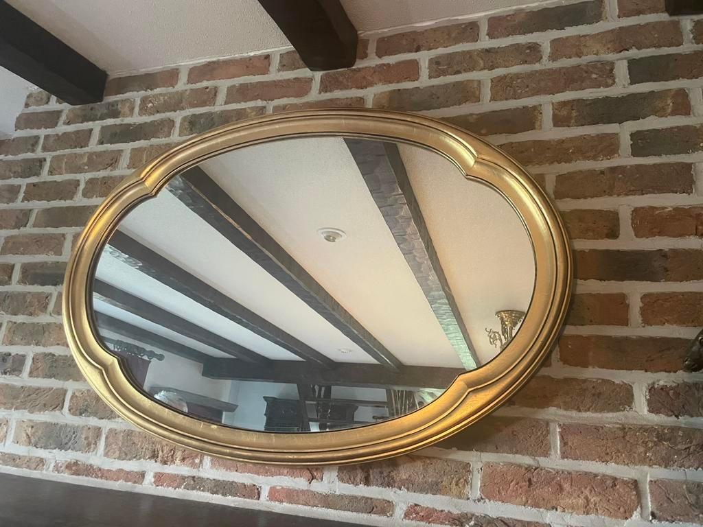 Ovaal gouden spiegel, Ophalen, Ovaal