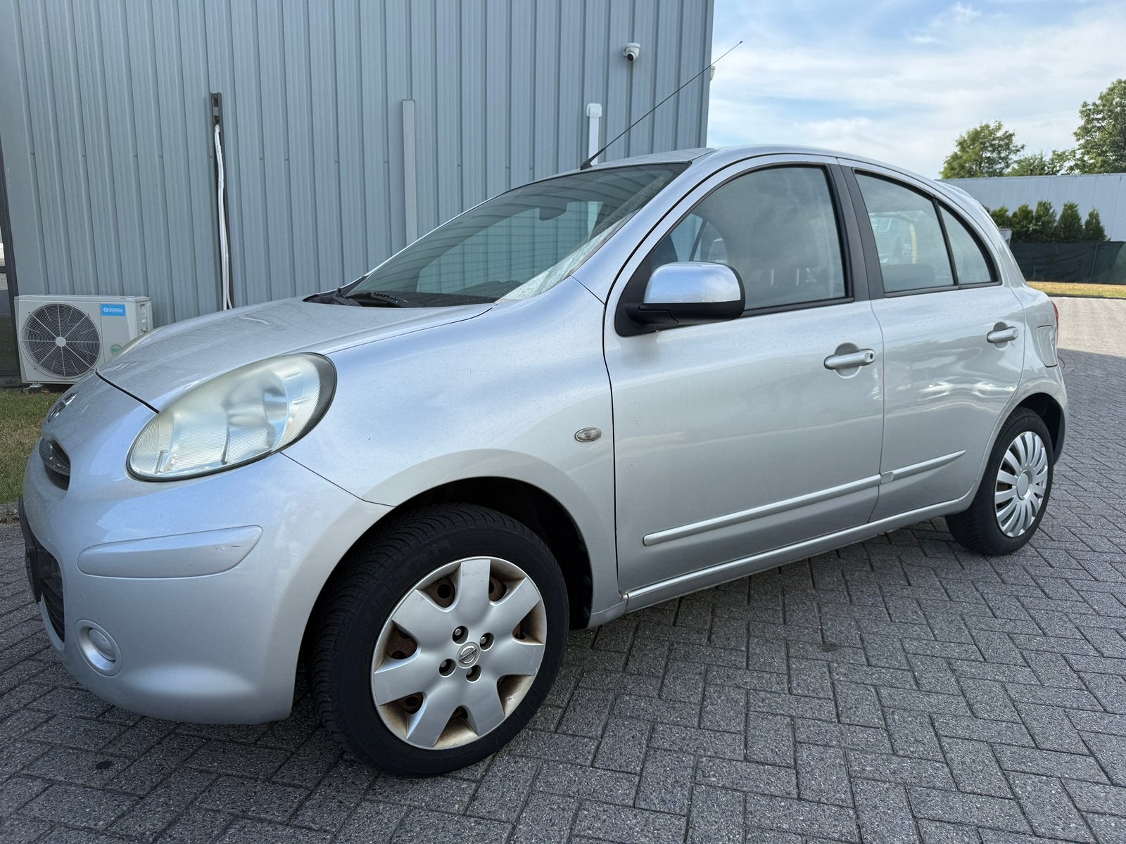 Nissan micra 1.2 benzine bj 2011 98000 km goede staat, Auto's, Nissan, Voorwielaandrijving, Euro 5, Stof, Zwart