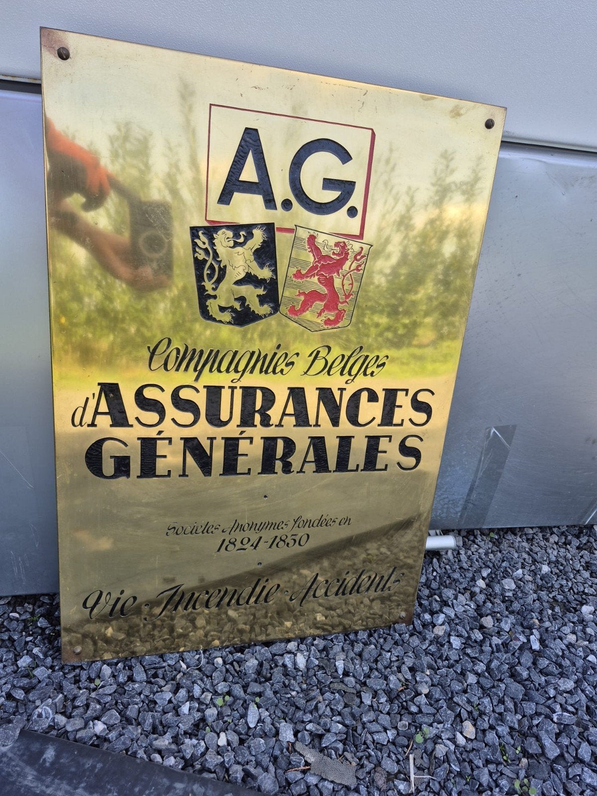 Plaque publicitaire AG assurance générale, Enlèvement