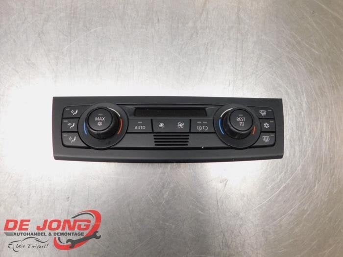 Panneau de commandes chauffage d'un BMW 1-Serie, -, 3 mois de garantie, Utilisé, -