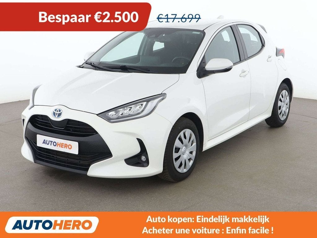 Toyota Yaris 1.5 Hybrid Comfort (bj 2023, automaat), Auto's, Toyota, Stof, Gebruikt, Euro 6, 116 pk
