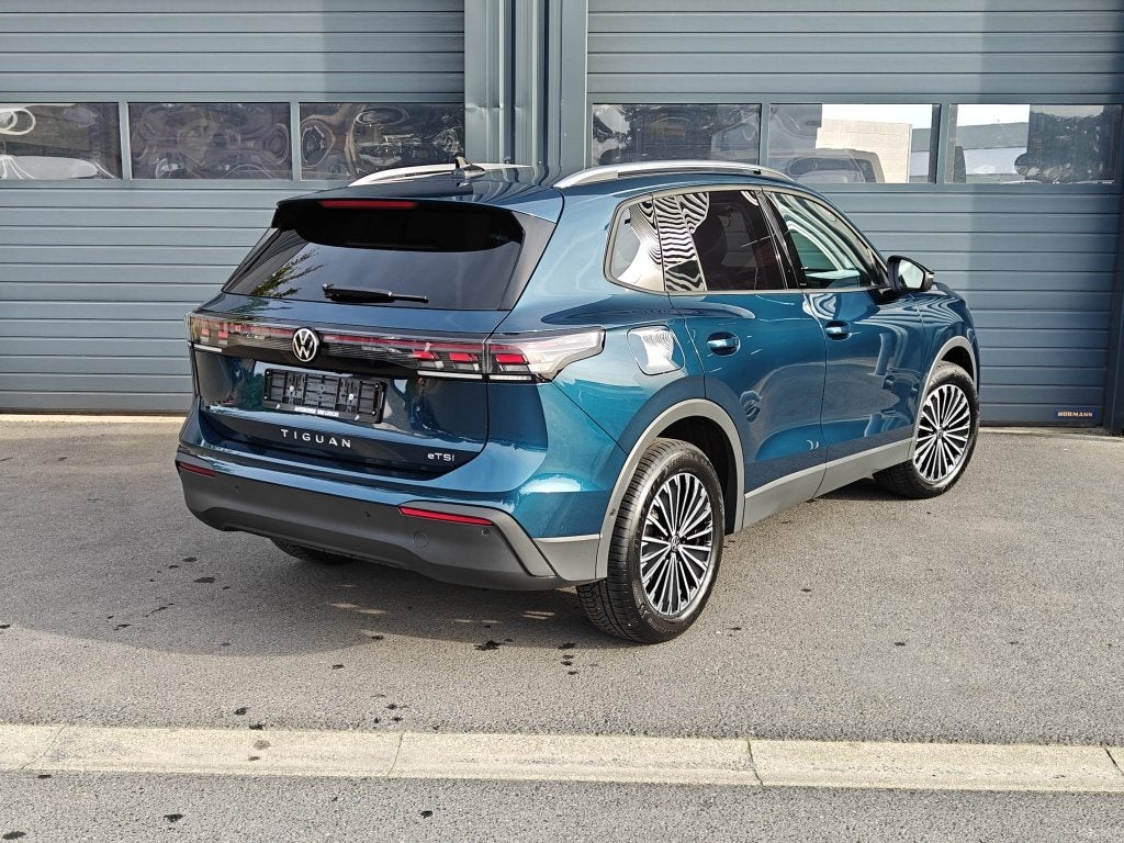VW Tiguan 1.5eTSI / DSG, Auto's, Dealer onderhouden, Stof, 1498 cc, 4 cilinders