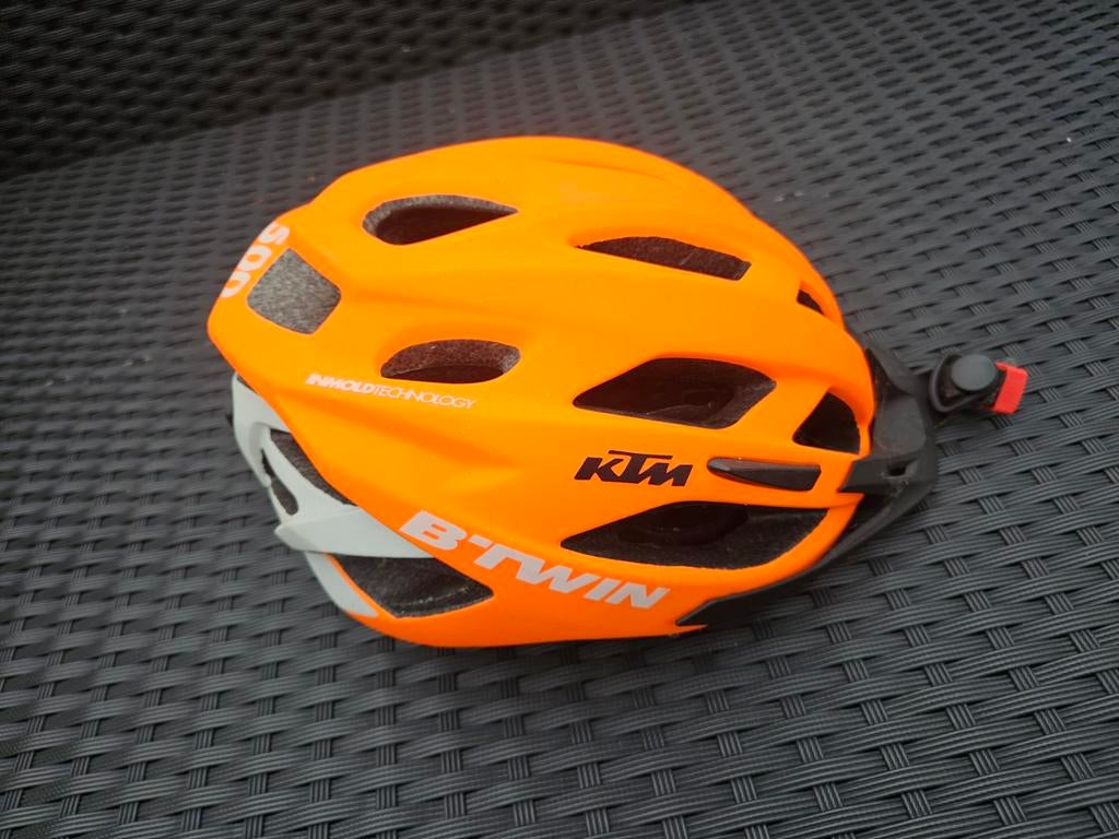 Casque de vélo Btwin orange fluo Medium, Enlèvement