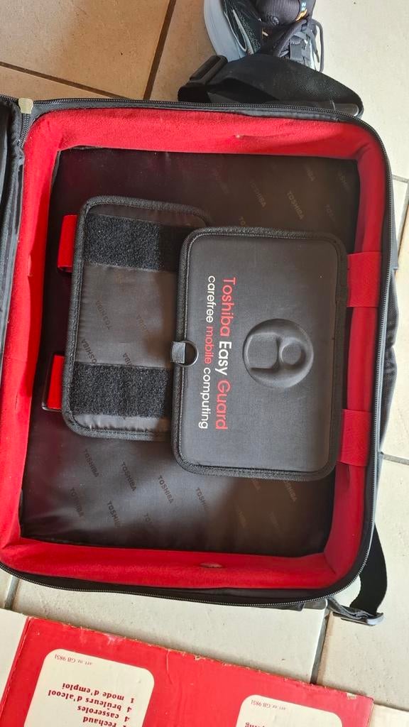 Laptop tas Toshiba, Enlèvement