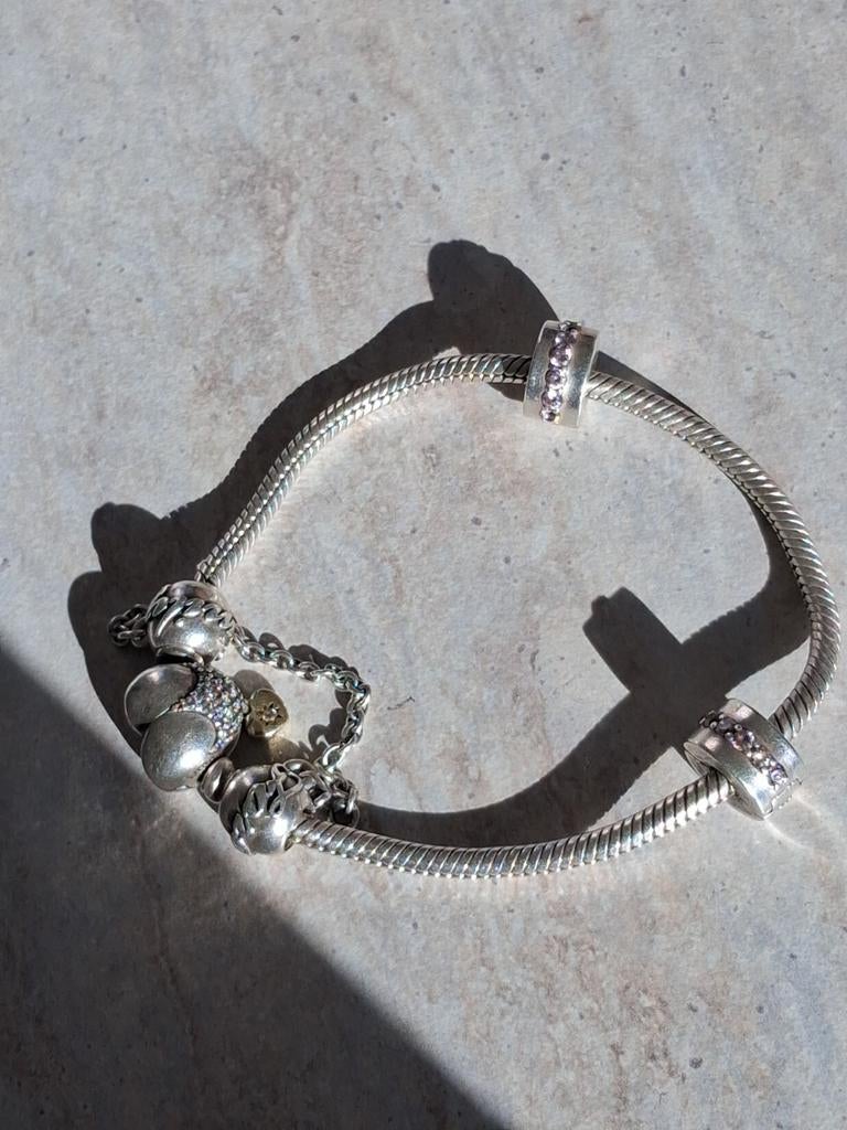 Pandora armband met bedels, Ophalen