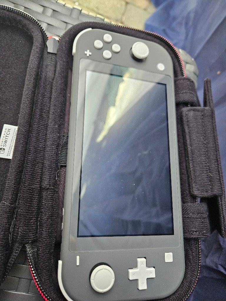 Nintendo Switch Lite grijs, Consoles de jeu & Jeux vidéo, Consoles de jeu | Nintendo Switch Lite, Enlèvement, Gris, Comme neuf