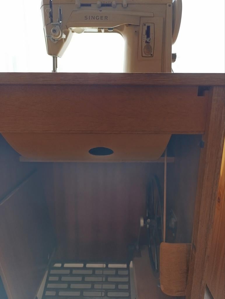 Naaimachine, Ophalen