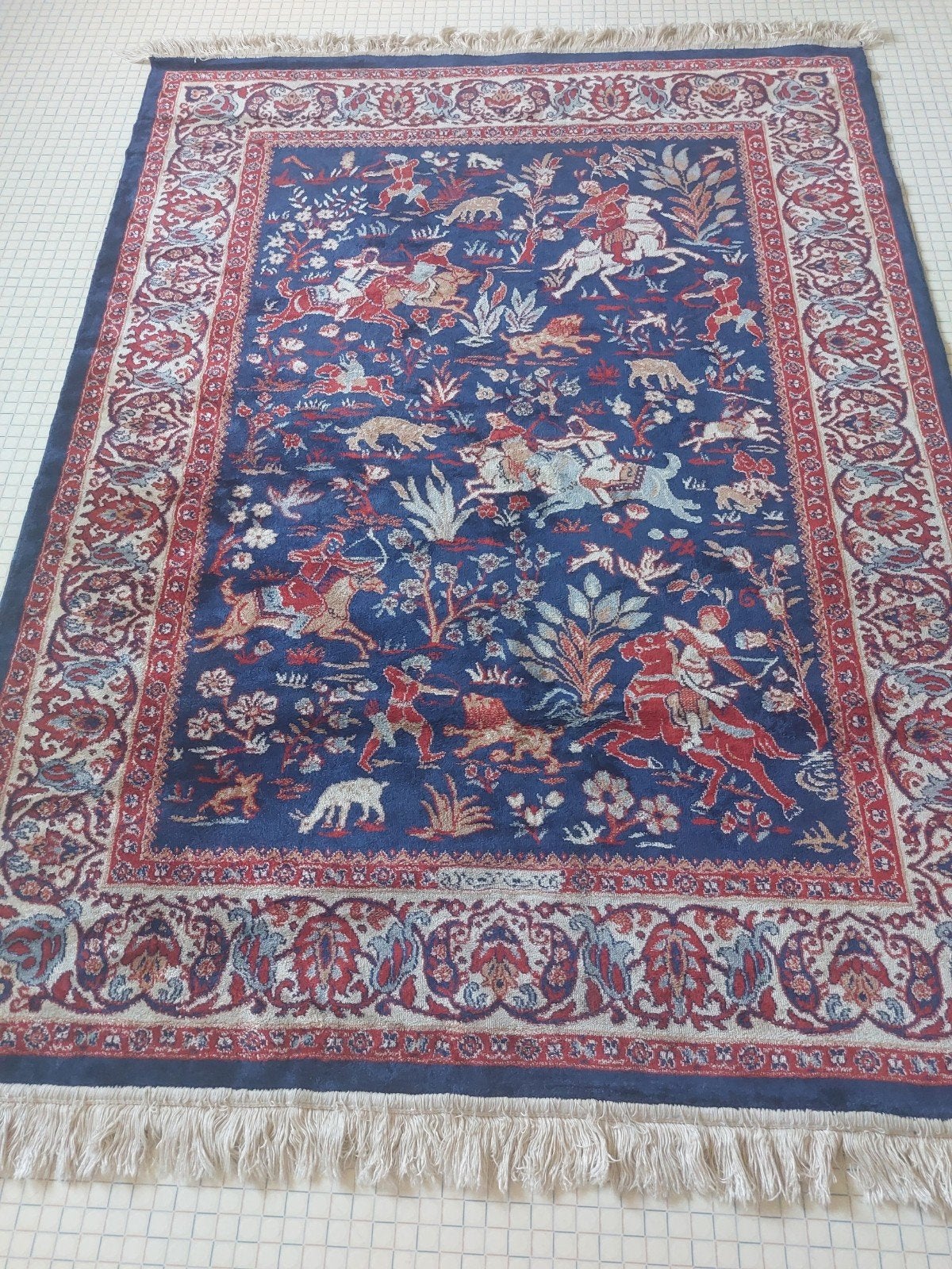 tapis iranien, Ophalen