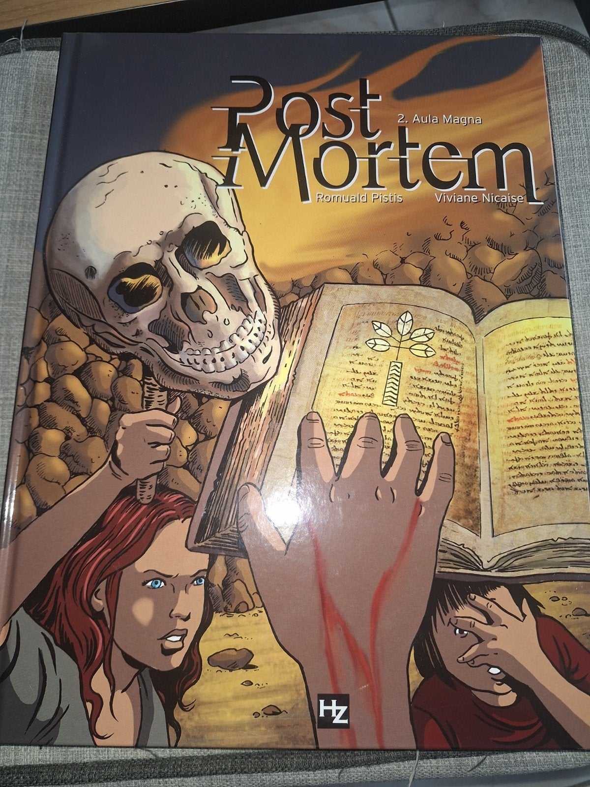 Post Mortem 2 Aula Magna Première édition, Eén stripboek, Zo goed als nieuw