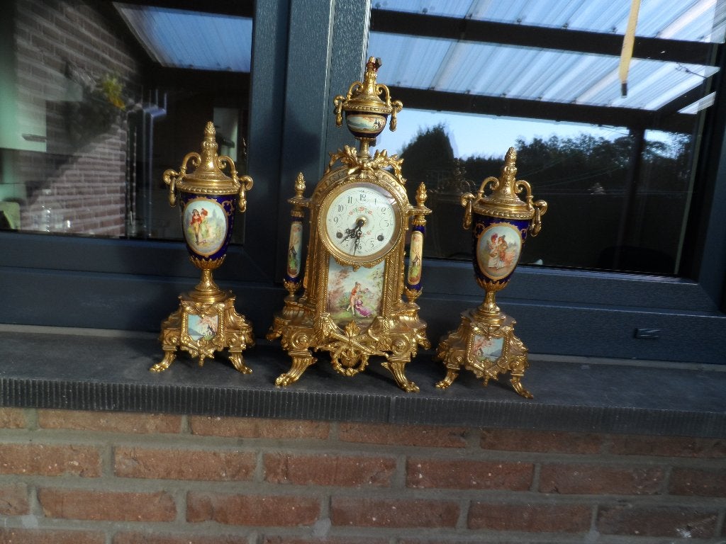 klok met kandelaars zeer mooi werkt, Ophalen