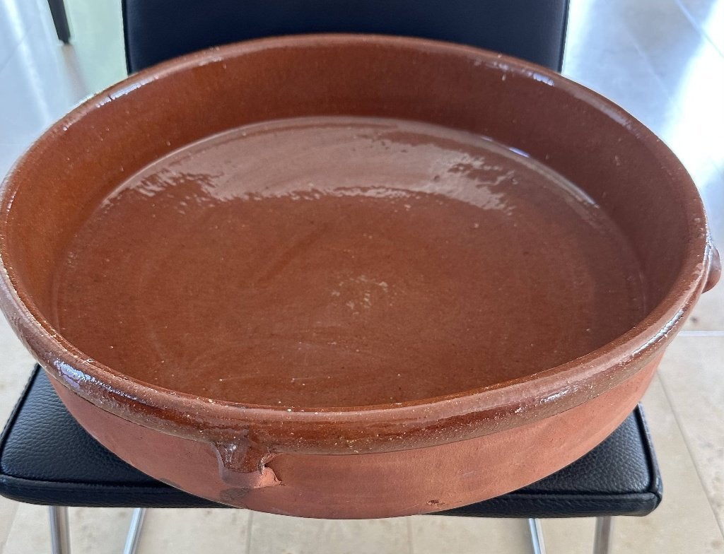 Spaanse terracotta schaal (La Bisbal), Ophalen