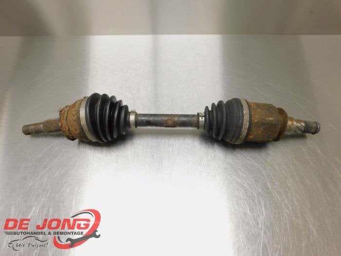 Arbre de transmission avant gauche d'un Nissan Navara, -, 3 mois de garantie, Utilisé, -