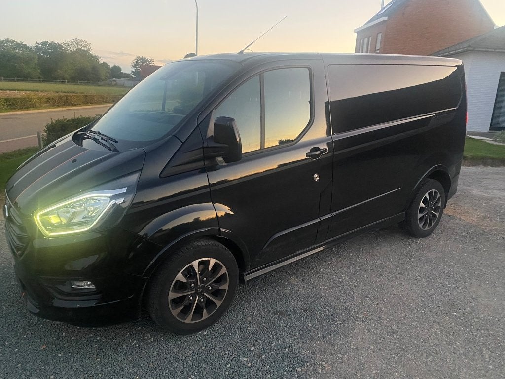 bestelwagen Ford Custom Sport - 1ste eigenaar, Auto's, 1995 cc, 4 cilinders, Leder en Stof, Zwart
