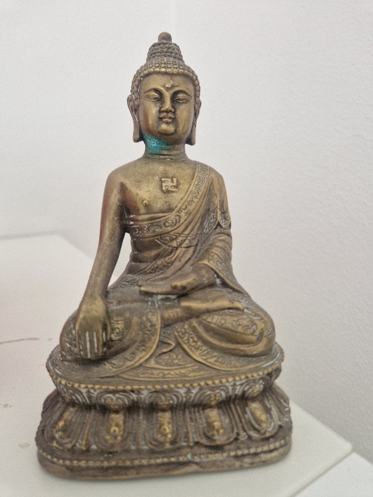 Bronzen boeddha beeldje, Ophalen