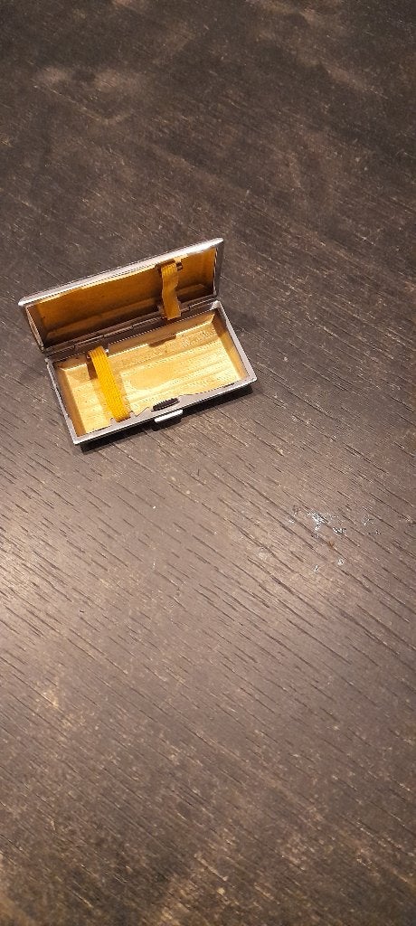 zilveren snuifdoosje, Ophalen