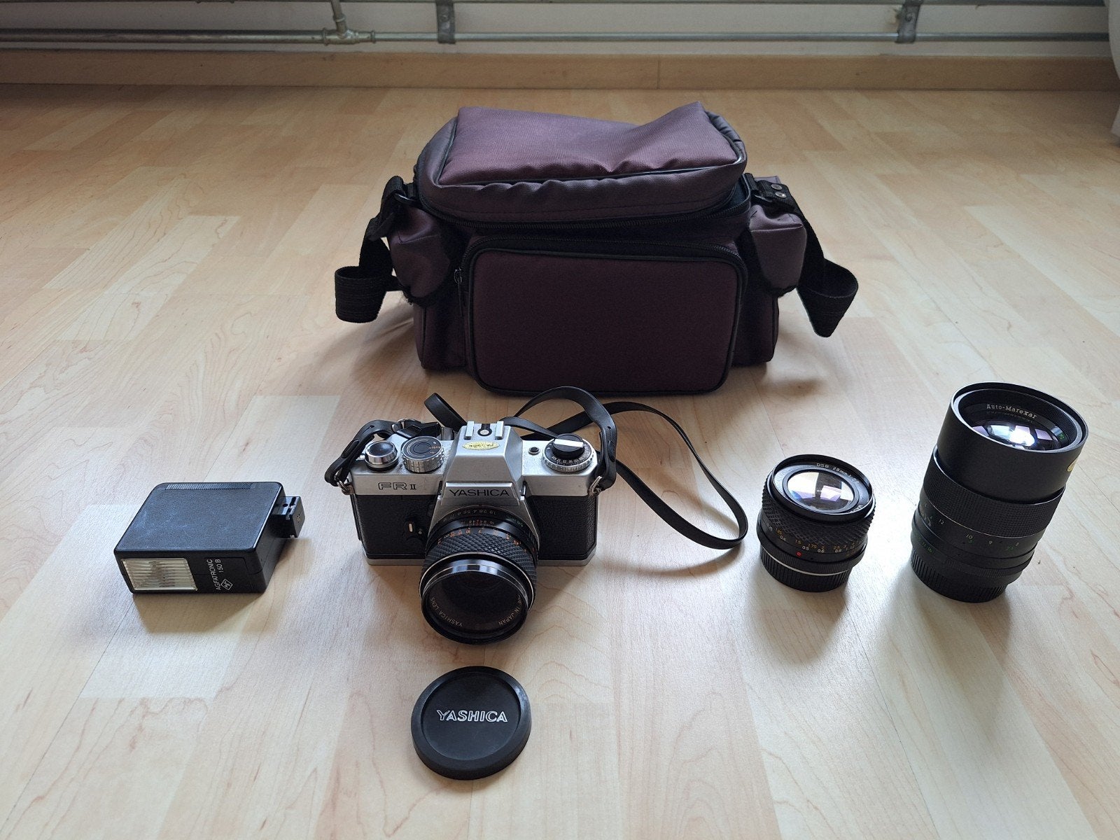 Yashica FR II analoge camera + lenzen, flitser en tas, Audio, Tv en Foto, Ophalen, Gebruikt, Spiegelreflex, Overige Merken