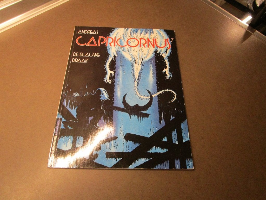 Capricornus - De blauwe draak - 2003 - 1e druk, Boeken, Eén stripboek, Nieuw, Ophalen of Verzenden, Andreas