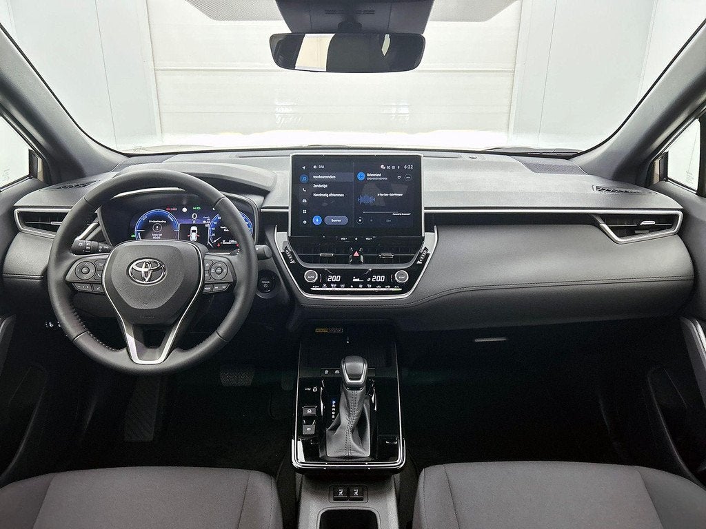 Toyota Corolla Cross 1.8 Hybrid Style | Achteruitrijcamera |, Auto's, Stof, Gebruikt, 750 kg, 4 cilinders
