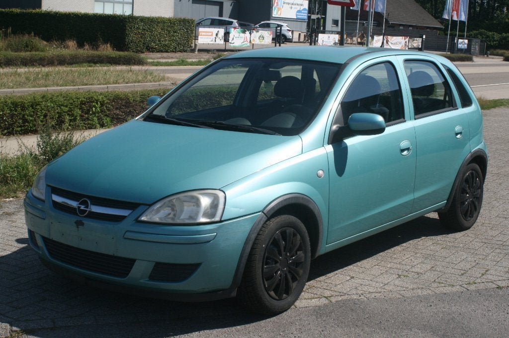 Opel Corsa C 2004 * 125d km * 1.2 benz *garantie*SPOTPRIJS!, Voorwielaandrijving, Stof, Zwart, Handgeschakeld