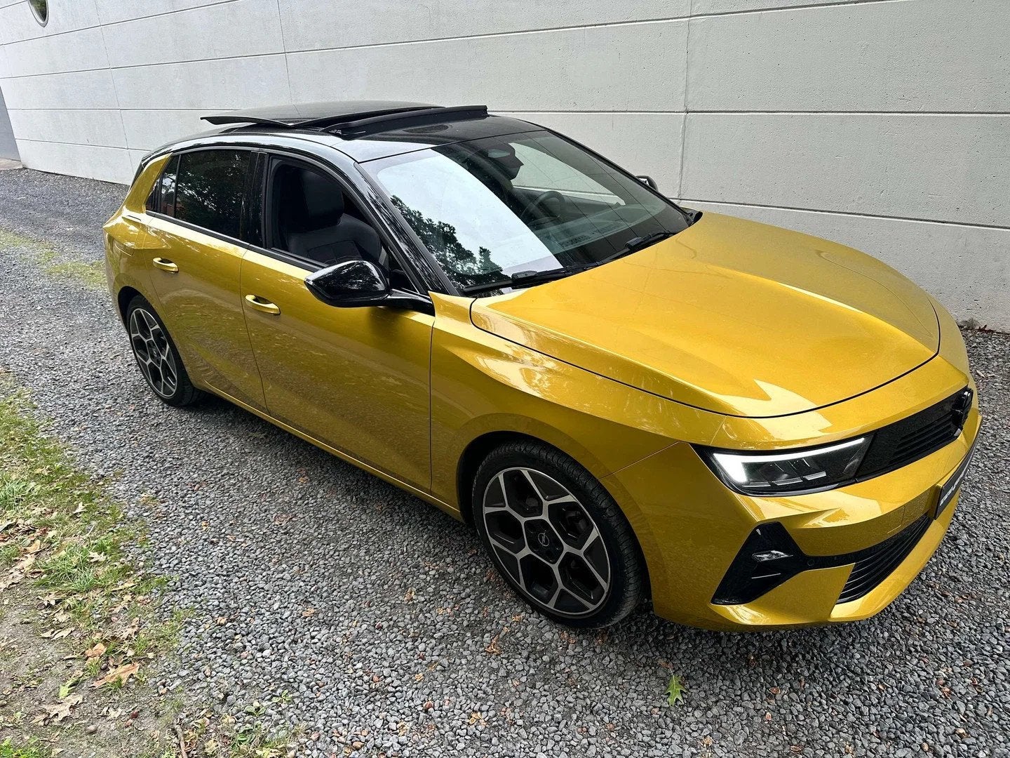 Opel Astra Astra 1.2 Turbo GS Line S/S (bj 2023), Auto's, Gebruikt, 1199 cc, Alcantara, Geel