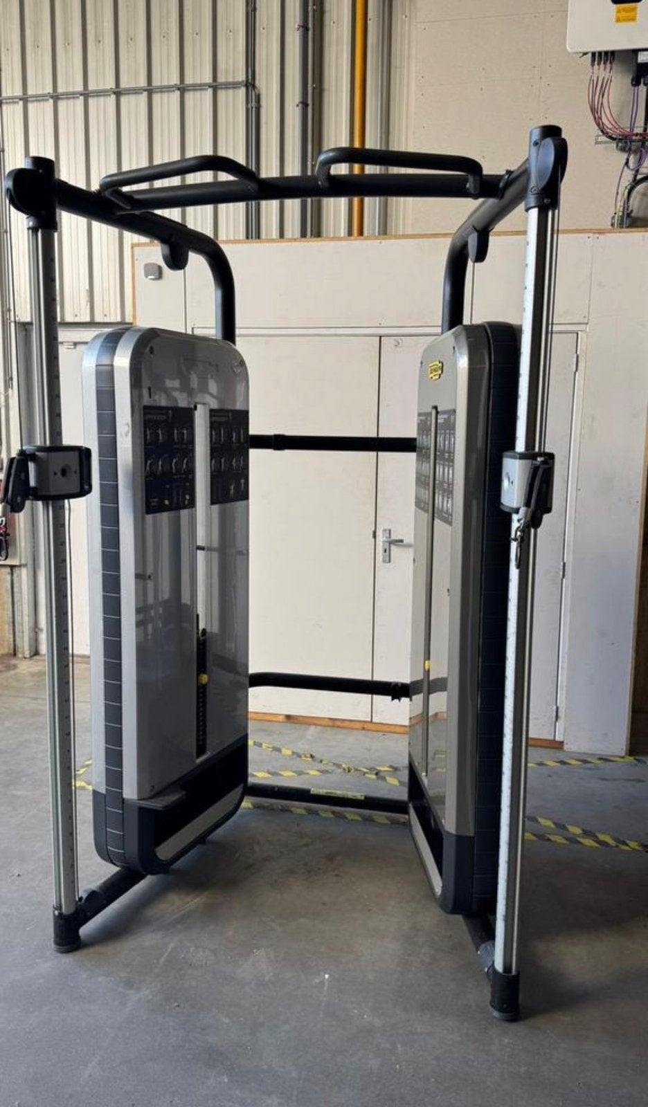 Zwarte Technogym Dual Adjustable Pulley, Sport en Fitness, Ophalen, Gebruikt, Rug, Overige typen