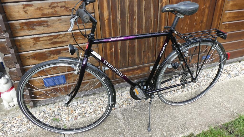 herenfiets Venturelli., Ophalen