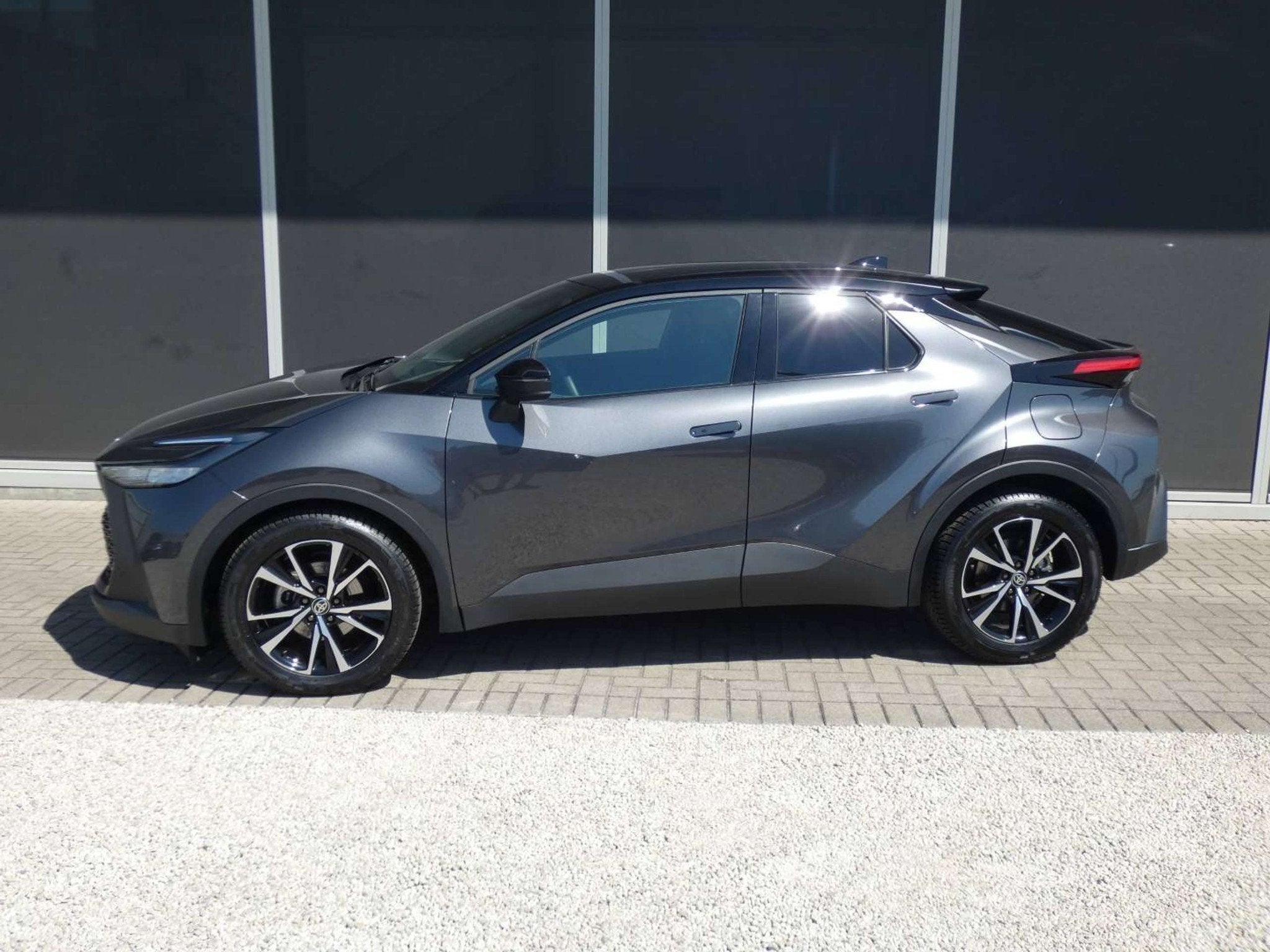 Toyota C-HR 1.8 Hybrid 140pk Dynamic plus +Trekhaak +Dodehoe, Autos, Argent ou Gris, Achat, Noir, 5 portes