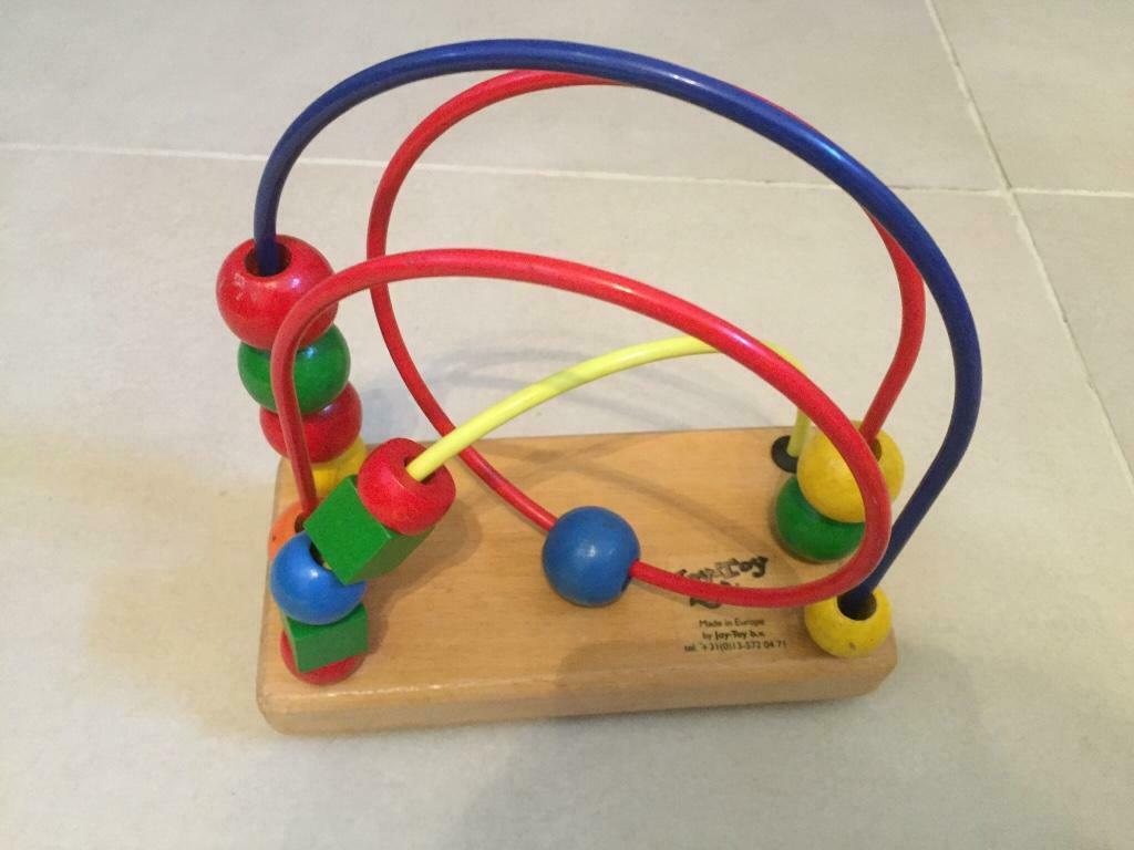 Spiraal met houten kralen, Enlèvement ou Envoi, Comme neuf