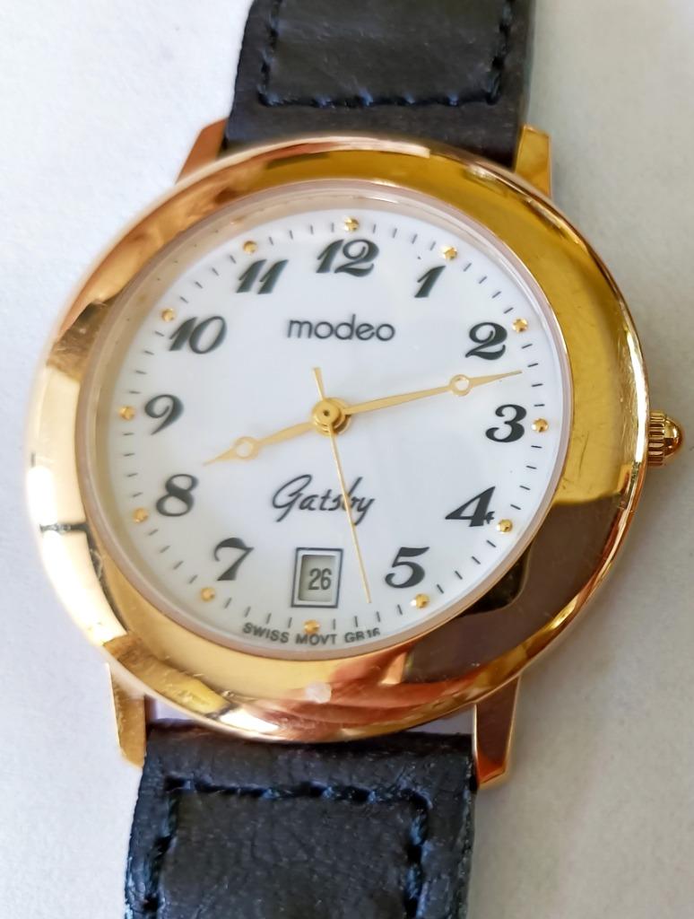 Montre quartz MODEO Gatsby plaqué or, brac. cuir tressé noir, Enlèvement ou Envoi, Neuf