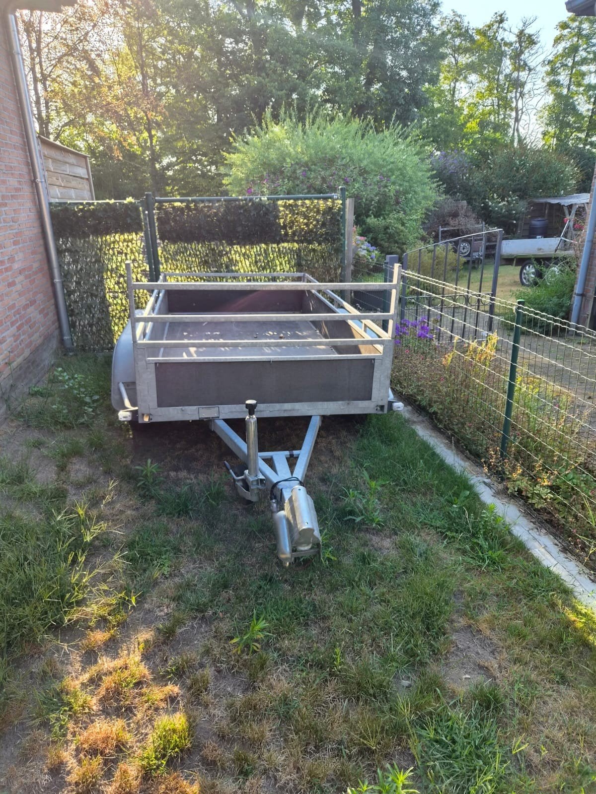ongeremde aanhangwagen met slot, Ophalen