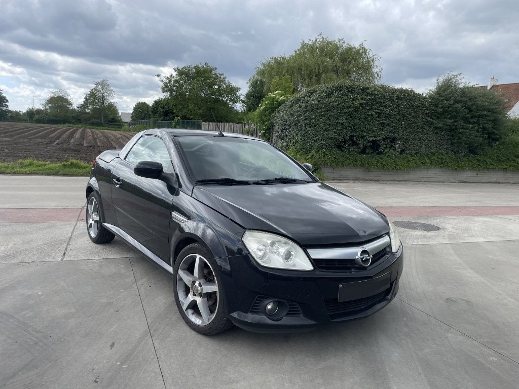 Opel Tigra 1.4 Benzine 143 000 km 2008, Voorwielaandrijving, Dealer onderhouden, Zwart, Leder