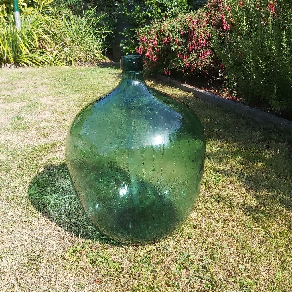 groene demijohn fles, Enlèvement, Utilisé