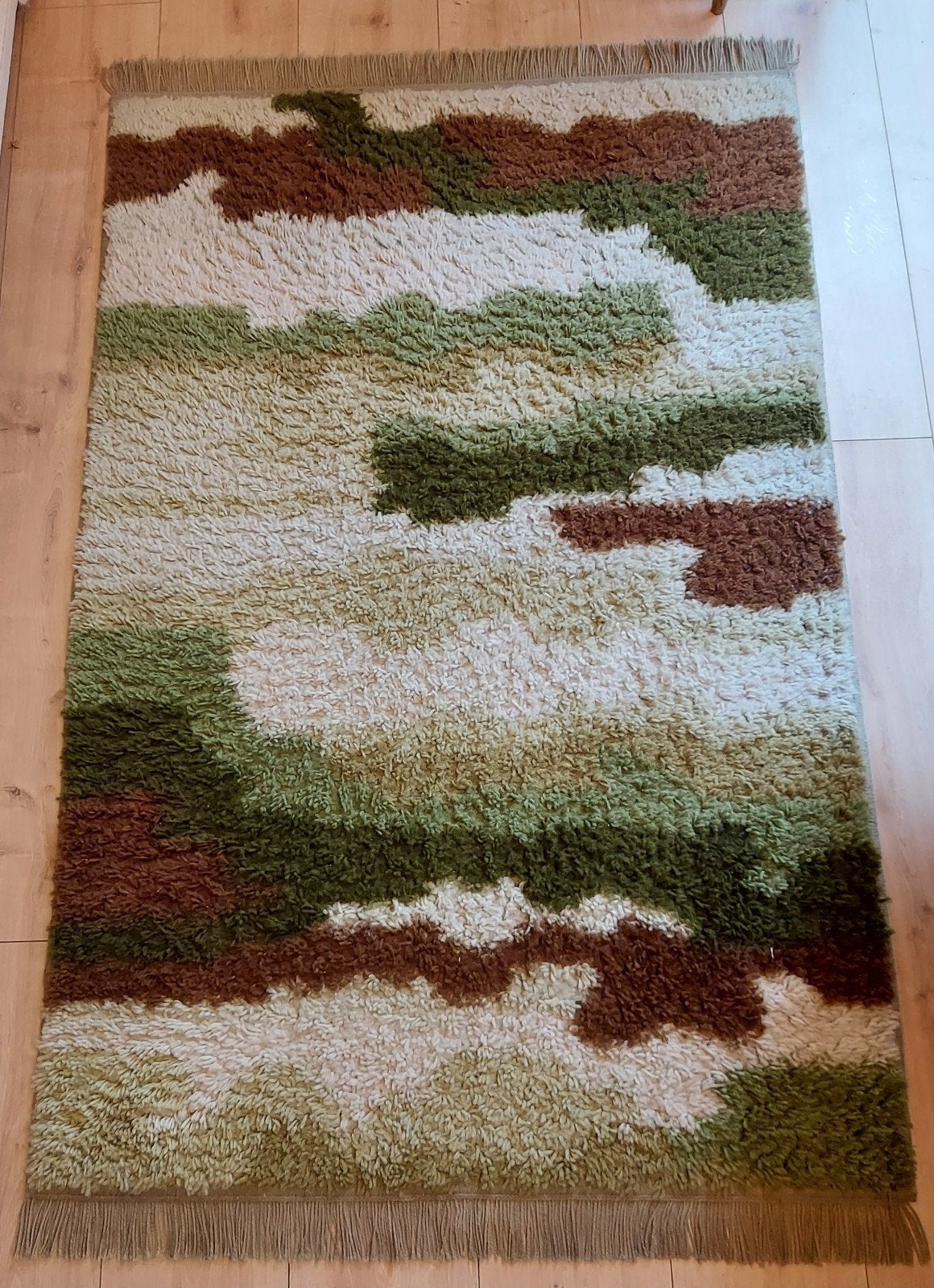 Vintage desso tapijt, Ophalen