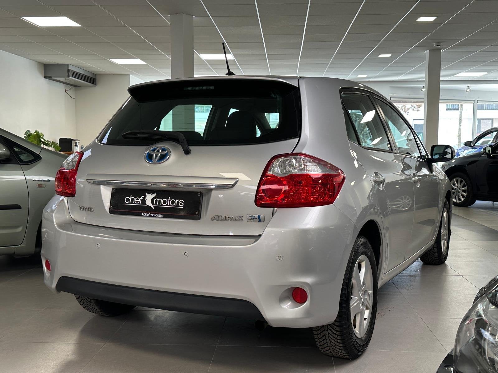 Toyota Auris 1.8 Hybrid Life | Hybride | CVT | Navigatiesyst, Auto's, Toyota, Euro 5, Stof, Gebruikt, 4 cilinders