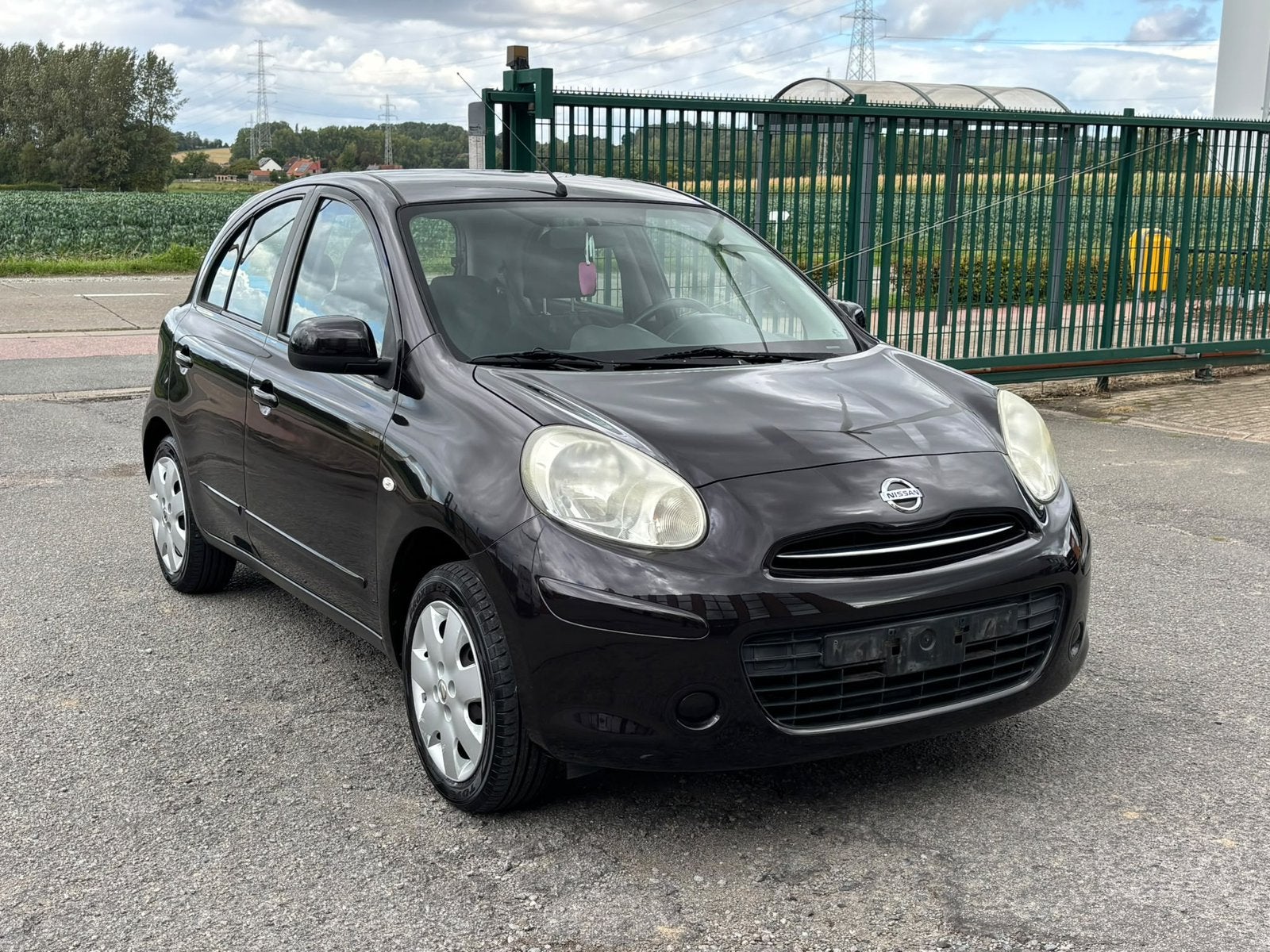 Nissan Micra 1.2 essence airco lez ok, Auto's, https://public.car-pass.be/vhr/ade5ffd6-8dc1-4462-9d00-55495994e9cc, 1198 cc, Zwart