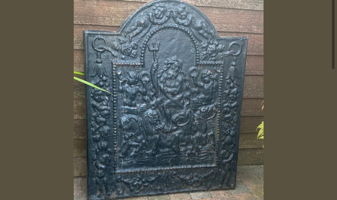 Oude, zware gietijzeren haardplaat, Ophalen