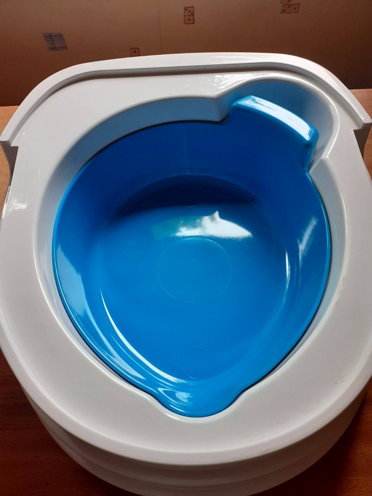 Kinder WC, Ophalen